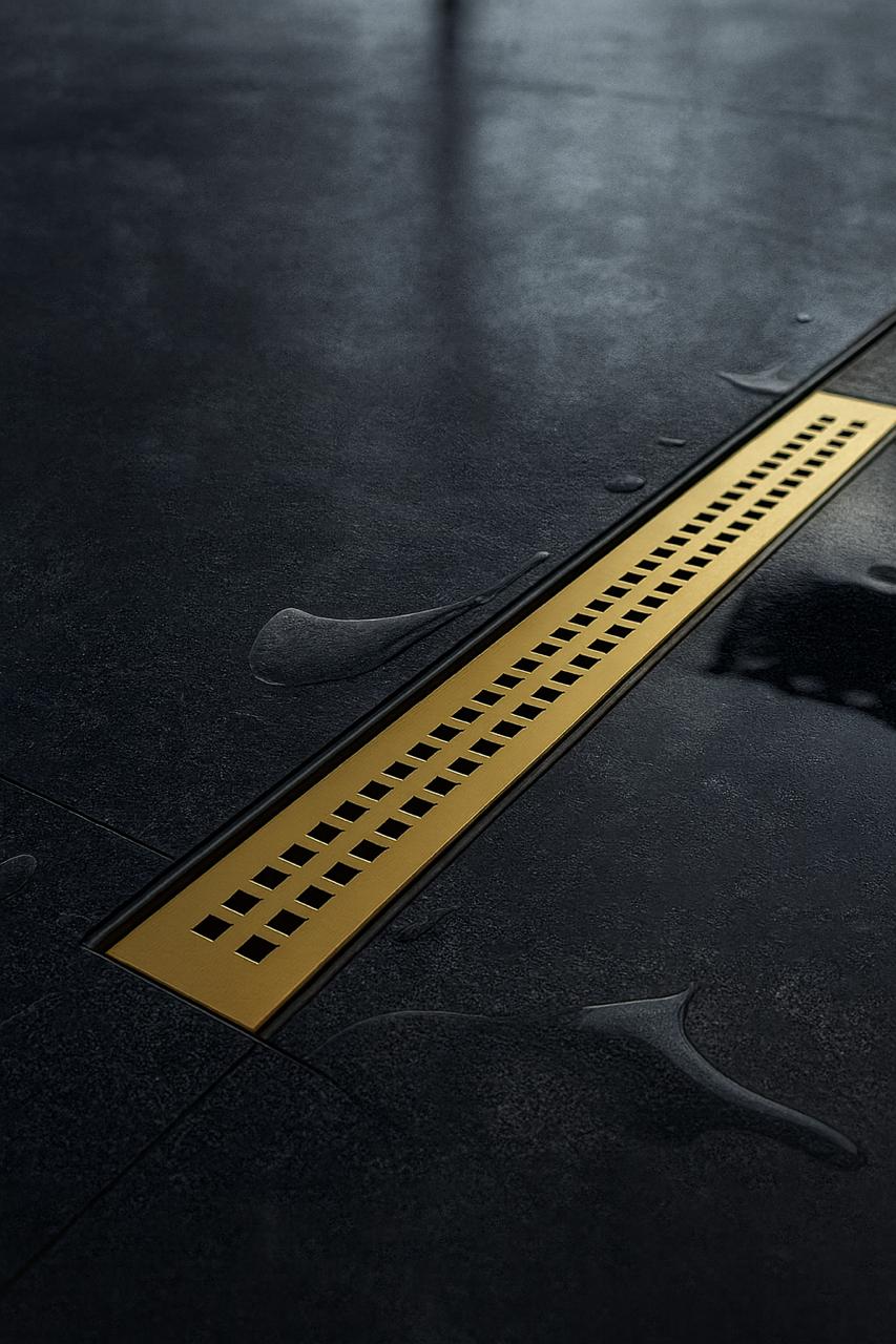 Трап линейный пластиковый АНИ Пласт TL1265B5M выпуск 40 мм решётка Риф золото матовое нержавеющая сталь 650 мм